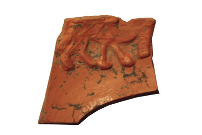 Fragment de vaixella fina (sigillata africana D) amb decoració figurada en estampilla